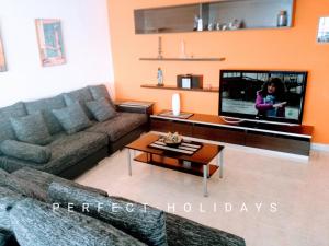 Telewizja i/lub zestaw kina domowego w obiekcie España Playa