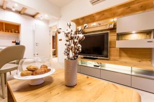 A kitchen or kitchenette at SCA Sofia City Apartments