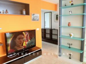 Telewizja i/lub zestaw kina domowego w obiekcie España Playa