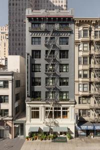 a large white building with a fire escape at Palihotel San Francisco in San Francisco
