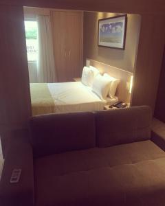 Katil atau katil-katil dalam bilik di HOT SPRINGS HOTEL Caldas Novas-FLAT VIP