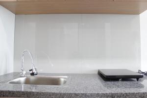 Fotografie z fotogalerie ubytování Minimalist Studio Room Taman Melati Apartment Jatinangor By Travelio v destinaci Bandung + 4 fotografie