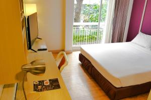 Postel nebo postele na pokoji v ubytování Trang Hotel Bangkok - SHA Plus