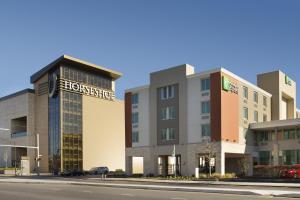 a rendering of a hotel on a city street at Holiday Inn Express Baltimore At The Stadiums, an IHG Hotel in Baltimore
