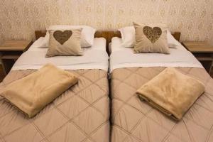 Postelja oz. postelje v sobi nastanitve Boki Apartmant