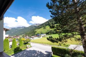 a view of a mountain from a house at Apartments Mooshof in Neustift im Stubaital