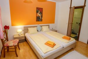 Katil atau katil-katil dalam bilik di Hotel Rosmann