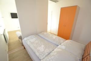 Postel nebo postele na pokoji v ubytování Schönbrunn (14): Sonniges City-Appartement