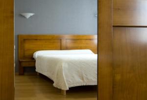 Postel nebo postele na pokoji v ubytování Hotel Etchoinia