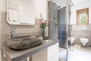 Kúpeľňa v ubytovaní Bologna Butterfly Apartment + 37 fotografií