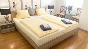 Katil atau katil-katil dalam bilik di Hotel Rosmann