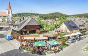 an overhead view of a town with a group of people at Gorgeous Apartment In Schonach With House A Mountain View in Schonach