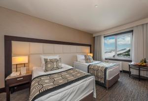 Postel nebo postele na pokoji v ubytování Sway Hotels