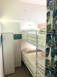 Postel nebo postele na pokoji v ubytování Hostellino + 26 fotografií