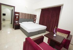Ένα ή περισσότερα κρεβάτια σε δωμάτιο στο Samara Hotel