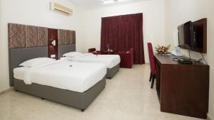Ένα ή περισσότερα κρεβάτια σε δωμάτιο στο Samara Hotel