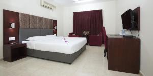 Ένα ή περισσότερα κρεβάτια σε δωμάτιο στο Samara Hotel