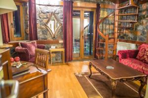 Posezení v ubytování Montecristo Chalet