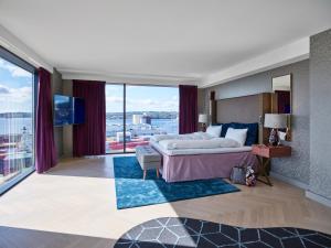 Giường trong phòng chung tại Radisson Blu Caledonien Hotel, Kristiansand +231 ảnh