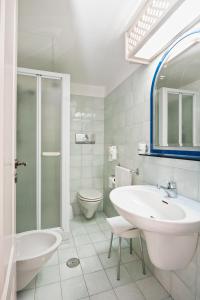 Koupelna v ubytování Hotel Gabbiano