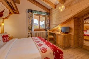 Ένα ή περισσότερα κρεβάτια σε δωμάτιο στο Hotel Gianna