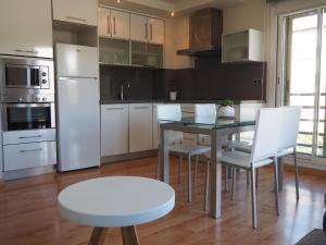 Kuchyň nebo kuchyňský kout v ubytování Apartamento Ainsa Pirineo + 7 fotografií