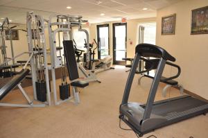 a gym with several tread machines in a room at Hampton Inn & Suites Cathedral City in Cathedral City