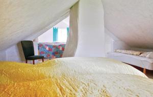 Voodi või voodid majutusasutuse 1 Bedroom Lovely Home In Dalum toas
