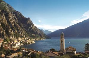 a view of a town next to a body of water at Residence La Madonnina in Limone sul Garda