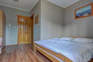 Ένα ή περισσότερα κρεβάτια σε δωμάτιο στο Guesthouse Yeti