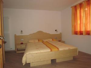 Postel nebo postele na pokoji v ubytování Agritur Maso Bornie