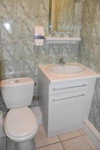 Koupelna v ubytování Hotel Gai Relais