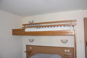 Postel nebo postele na pokoji v ubytování Hotel Gai Relais