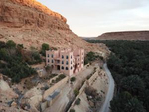 an aerial view of a building on a mountain at Maison D'hotes Sahara in Aoufous