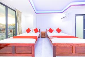 Ліжко або ліжка в номері Q3 Viet An Hotel Nha Trang