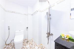 Koupelna v ubytování Q3 Viet An Hotel Nha Trang + 16 fotografií