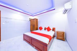 Ένα ή περισσότερα κρεβάτια σε δωμάτιο στο Q3 Viet An Hotel Nha Trang