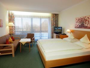 Łóżko lub łóżka w pokoju w obiekcie Appartementhotel Griesbacher Hof +13 zdjęć