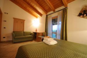 Postel nebo postele na pokoji v ubytování Agritur Campo Fiorito