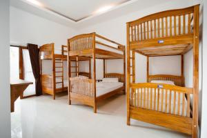 Postel nebo postele na pokoji v ubytování Double'D Hostel