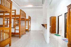 Postel nebo postele na pokoji v ubytování Double'D Hostel