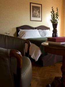 Postel nebo postele na pokoji v ubytování Relaisfranciacorta