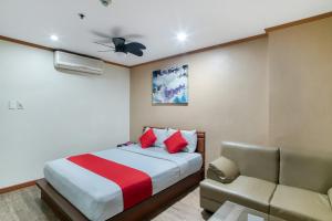 Postel nebo postele na pokoji v ubytování DG Grami Hotel