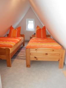 Ein Bett oder Betten in einem Zimmer der Unterkunft Haus Jancker