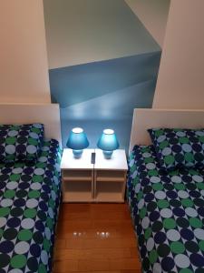 Voodi või voodid majutusasutuse Apartman KEJ BLUE free parking toas