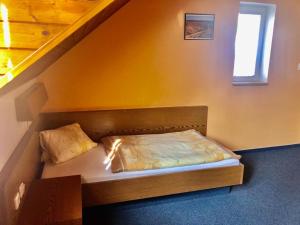 Postel nebo postele na pokoji v ubytování hotel Nautilus
