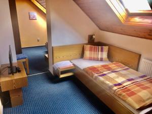 Postel nebo postele na pokoji v ubytování hotel Nautilus + 35 fotografií