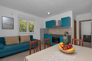 Kuchyň nebo kuchyňský kout v ubytování Apartments Ferdo