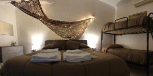 Postel nebo postele na pokoji v ubytování B&B Planet