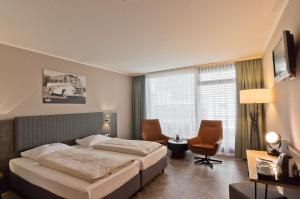 Arthotel ANA Neotel 객실 침대